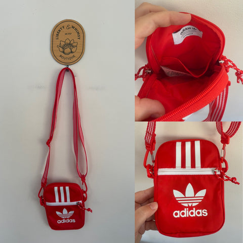 Adidas girls small red bag as new, small dust mark on zip if I’m being fussy