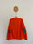 Adidas Climalite l/s orange shirt Sz 9-10 as new, dot on elbow pad as pictured