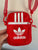 Adidas girls small red bag as new, small dust mark on zip if I’m being fussy